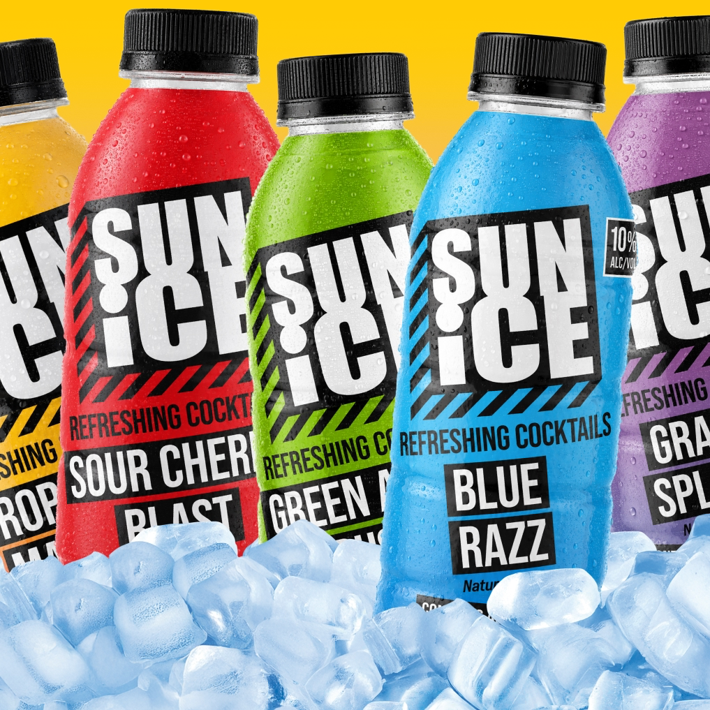 SUN ICE bottles on ice — Tropical Mango, Sour Cherry Blast, Green Apple Rush, Blue Razz, Grape Splash, and Pink Lemonade.