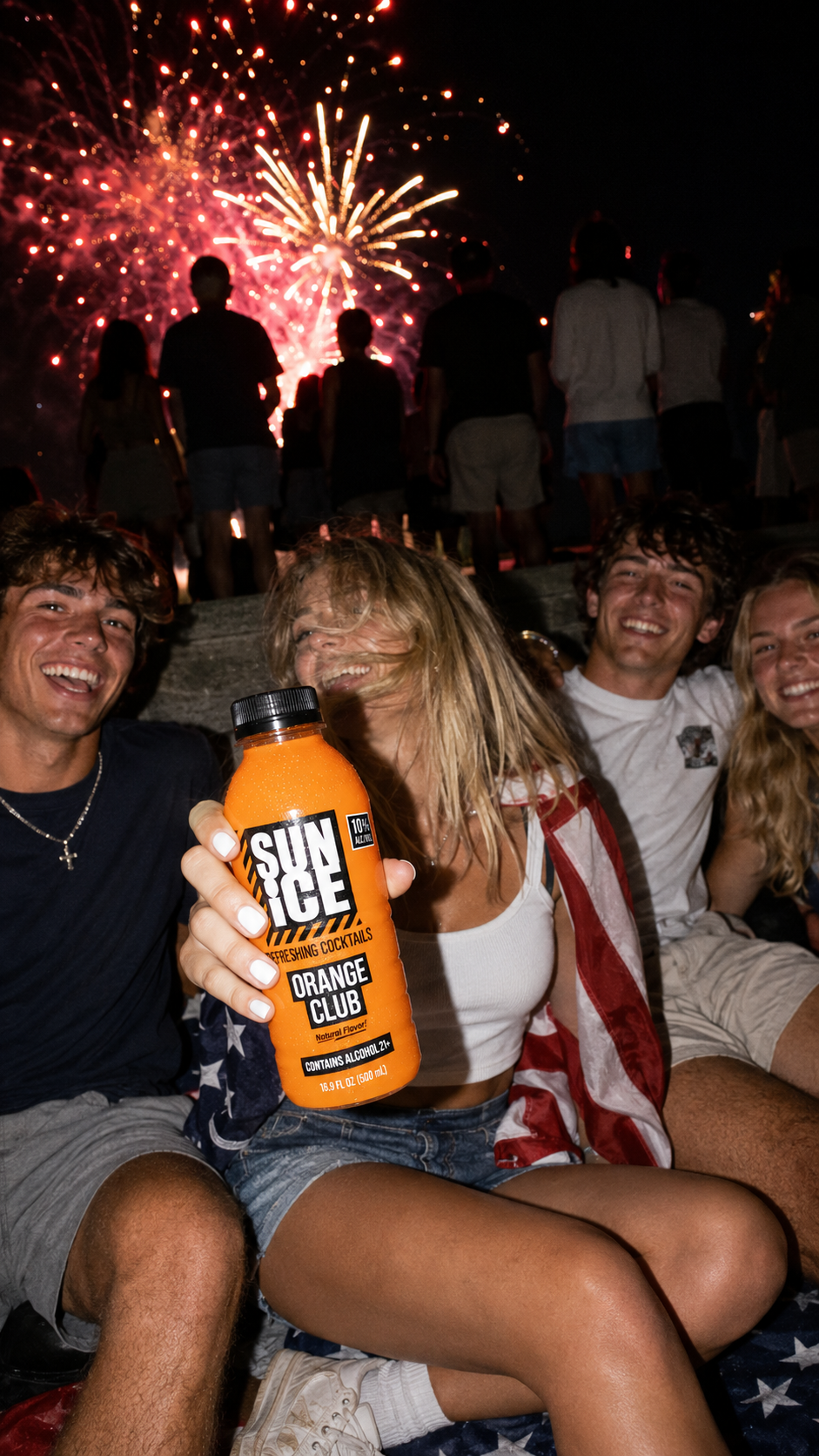 Friends watching fireworks with Orange Club SUN ICE.